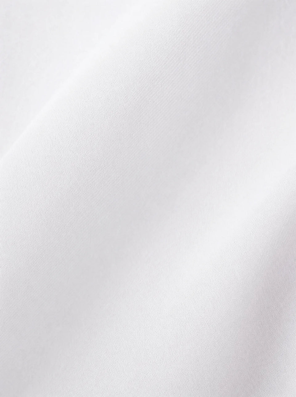 Camicia con bottoni gioiello bianca, dettaglio tessuto