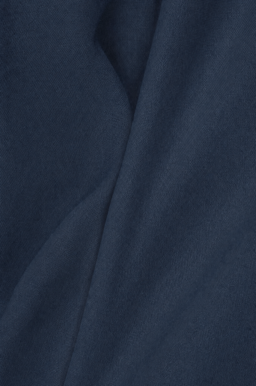 Dettaglio del tessuto popeline di cotone stretch blu