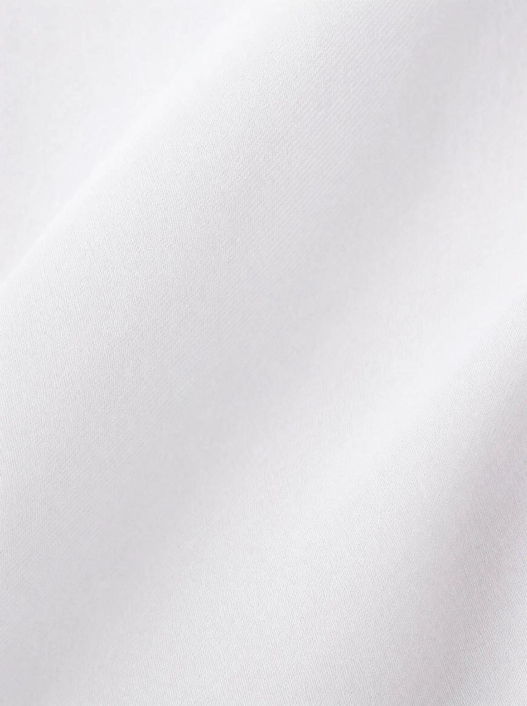 Camicia con bottoni gioiello bianca, dettaglio tessuto